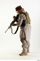  Photos Luis Donovan Army Taliban Gunner Poses charging gun standing whole body 0003.jpg